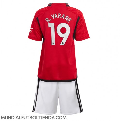 Camiseta Manchester United Raphael Varane #19 Primera Equipación Replica 2023-24 para niños mangas cortas (+ Pantalones cortos)